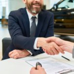Man Shaking Hand After Buying A Car | Safeguard | 6 End-of-Year Marketing Ideas for Automotive Dealers